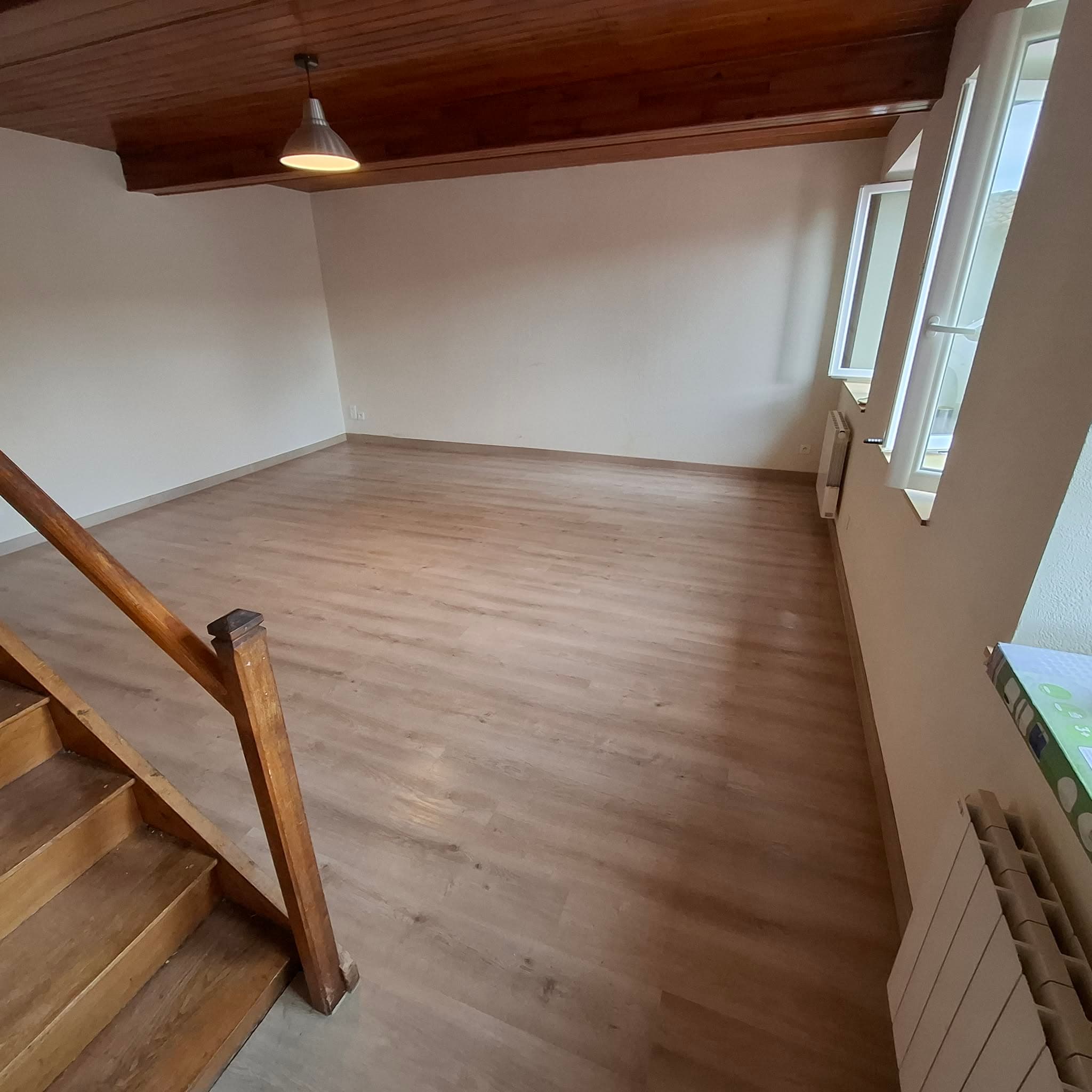 Pose parquet stratifié à Saint-Laurent-de-Mure — Avant/Après - Image 2